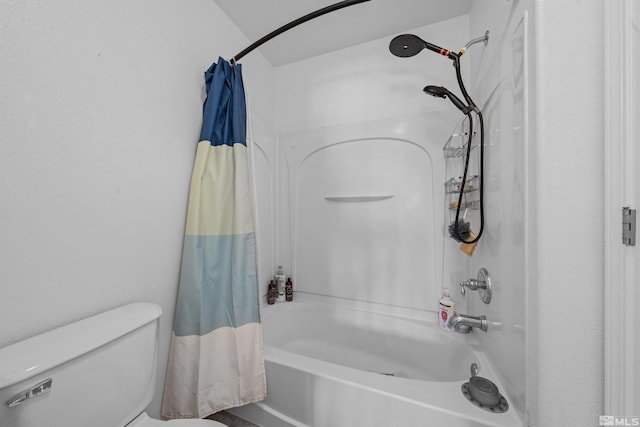 bathroom with toilet and shower / tub combo with curtain