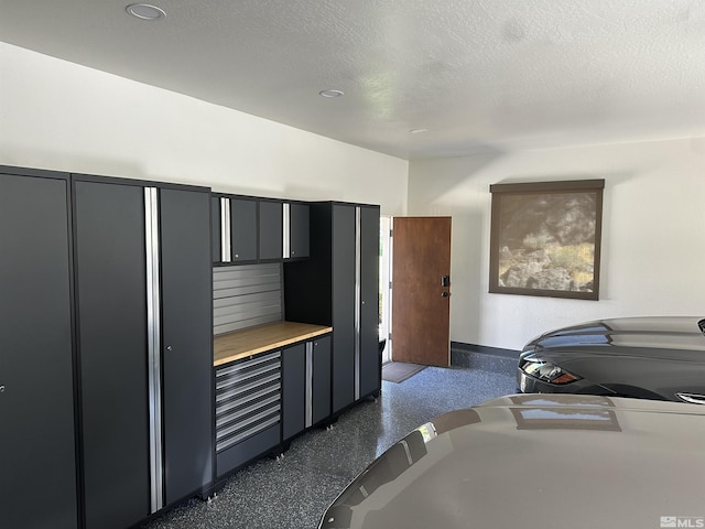 kitchen with a textured ceiling