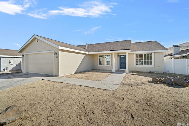 single story home with a garage