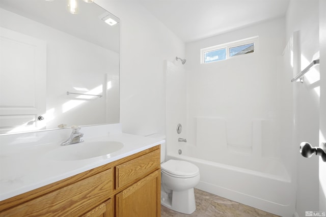 full bathroom with vanity, toilet, and shower / washtub combination