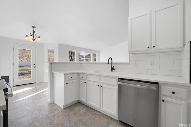 kitchen featuring dishwasher, white cabinetry, decorative backsplash, sink, and kitchen peninsula