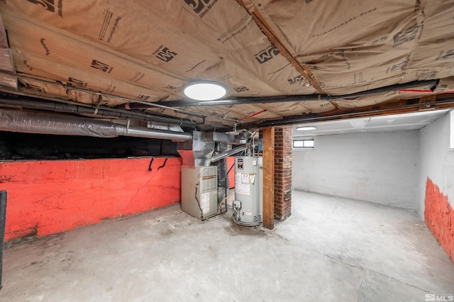 basement with gas water heater and heating unit