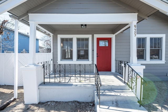 property entrance featuring covered porch