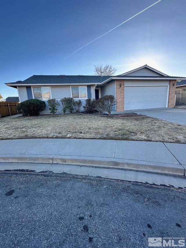 single story home with a garage