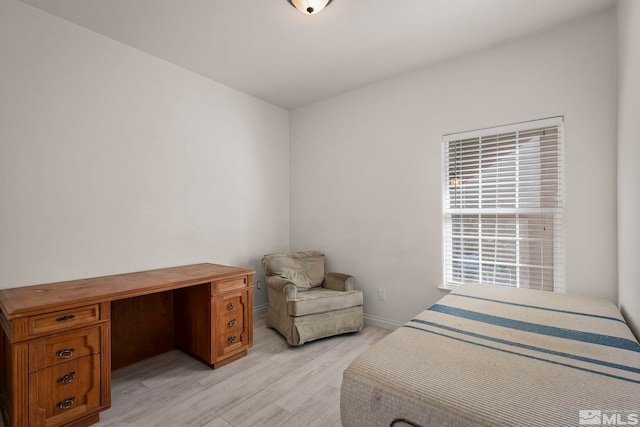 bedroom with light hardwood / wood-style floors