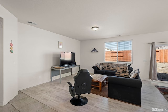 living room featuring light wood-type flooring