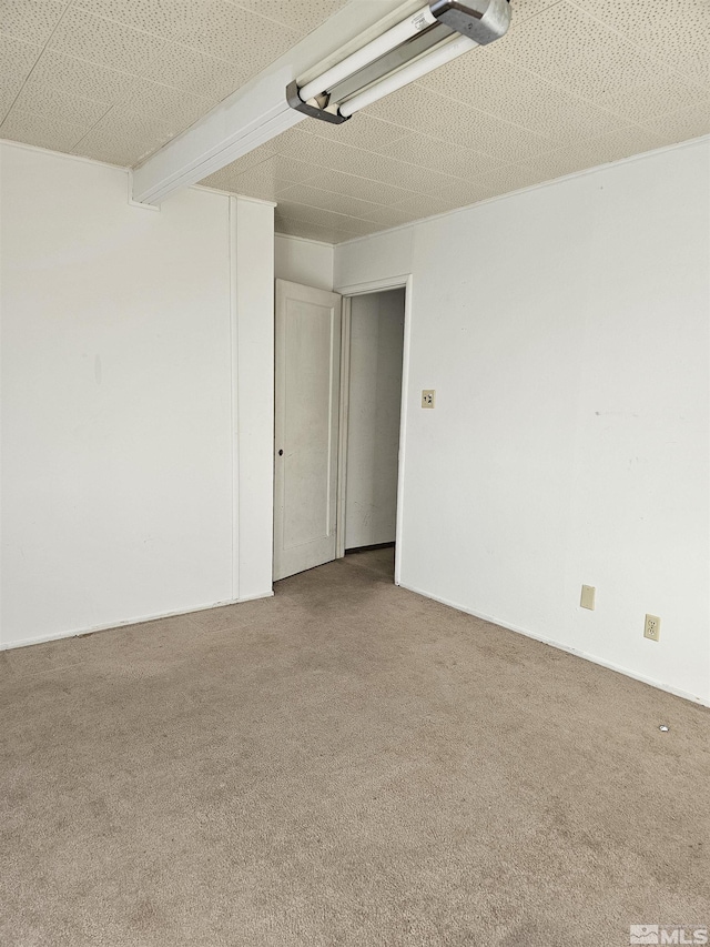 spare room with carpet flooring