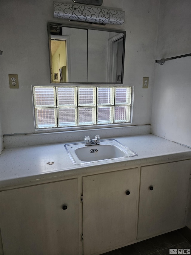 bathroom featuring sink and tile patterned floors