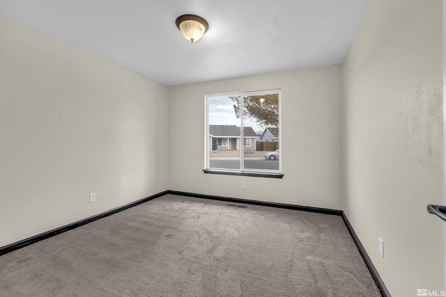 view of carpeted spare room