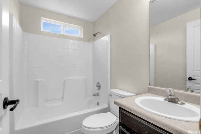 full bathroom featuring vanity, toilet, and shower / bath combination