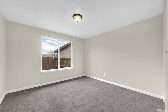 view of carpeted spare room