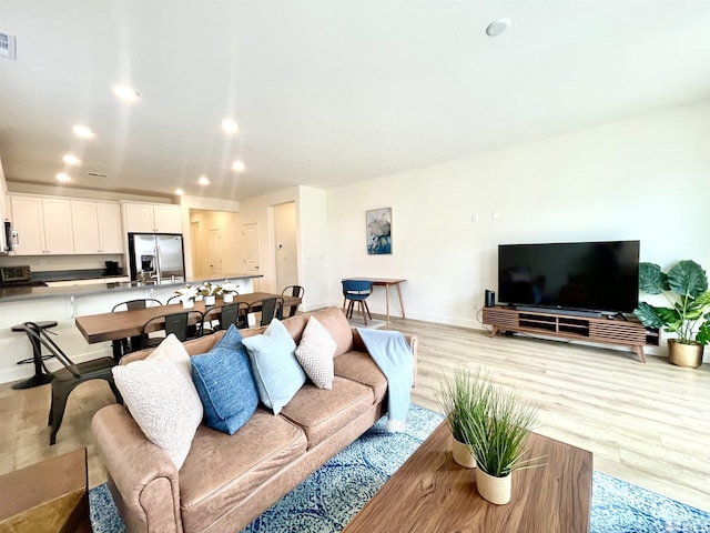 living room featuring light wood-type flooring