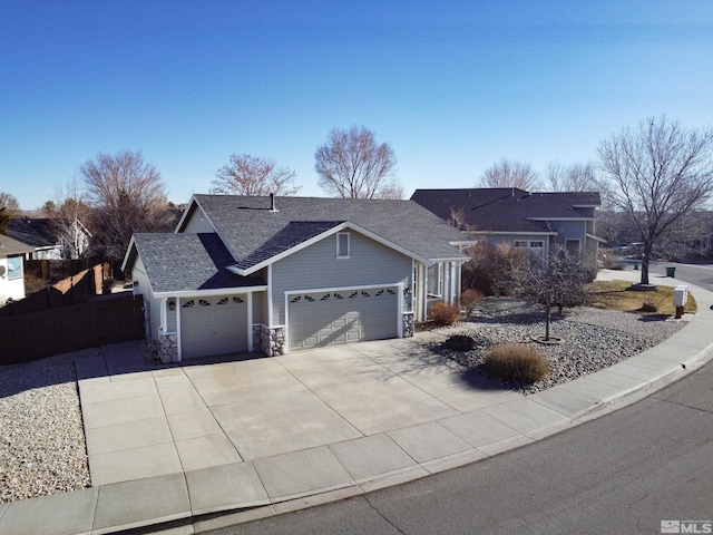 single story home featuring a garage