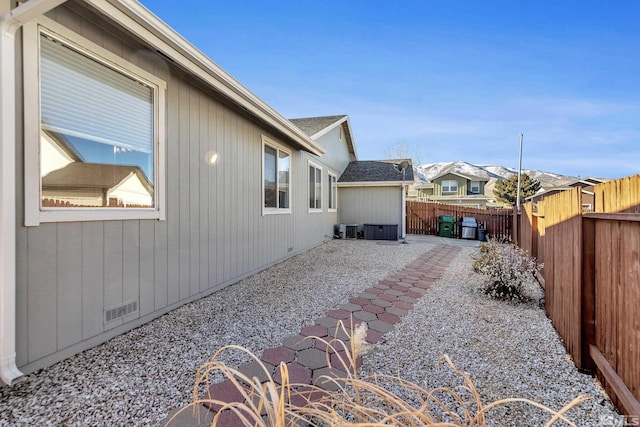 view of yard with a patio and cooling unit