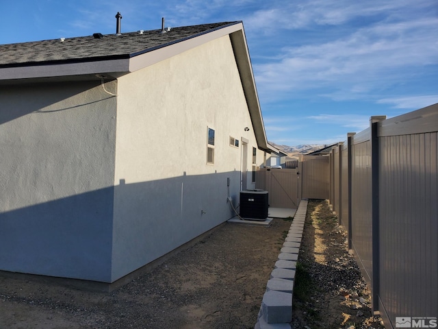 view of home's exterior featuring central air condition unit