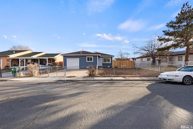 ranch-style home featuring a garage