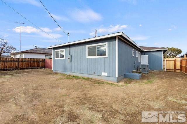 back of property with central AC unit