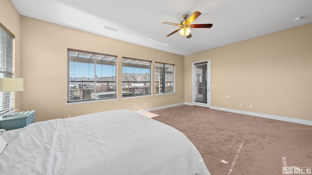 bedroom with ceiling fan and carpet flooring