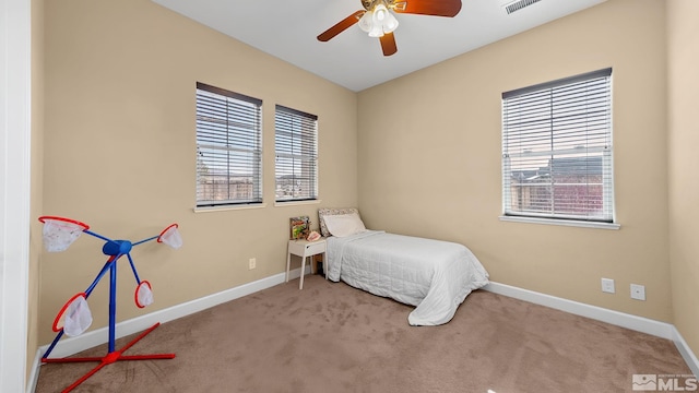 bedroom featuring ceiling fan and carpet flooring