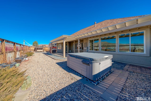 view of yard with a hot tub and a patio