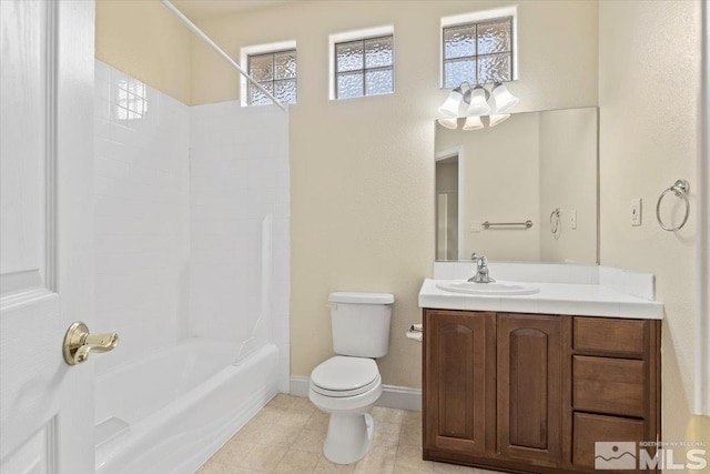 full bathroom with shower / tub combination, vanity, and toilet