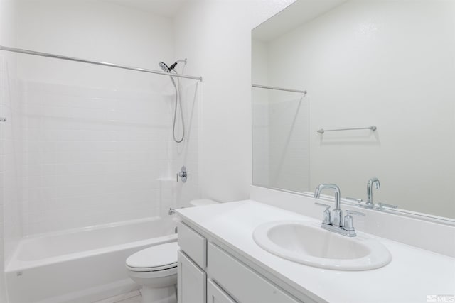 full bathroom featuring shower / bath combination, vanity, and toilet