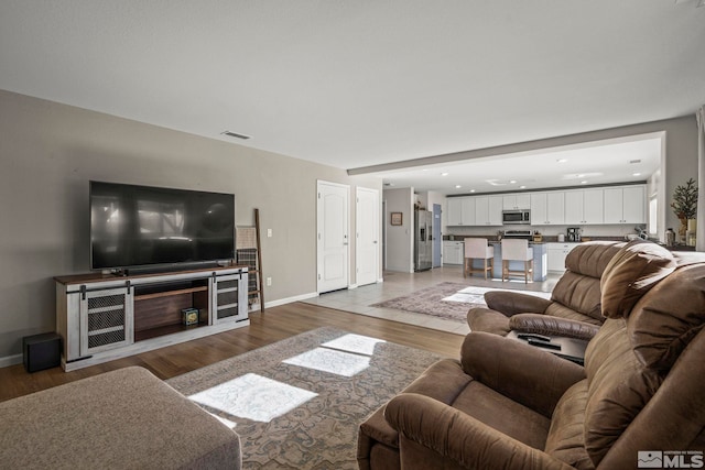 living room with hardwood / wood-style floors