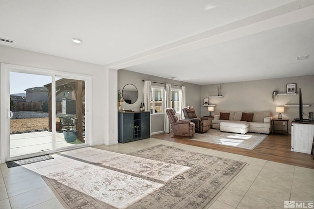 living room featuring light tile patterned floors