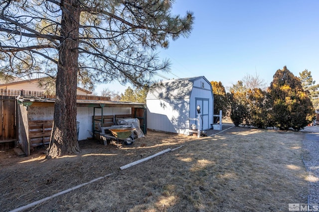 view of home's exterior with a storage unit