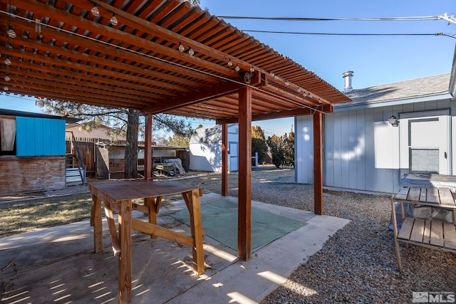 view of patio / terrace with a storage unit