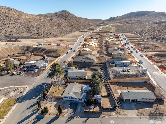 drone / aerial view featuring a mountain view