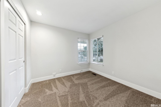 view of carpeted spare room