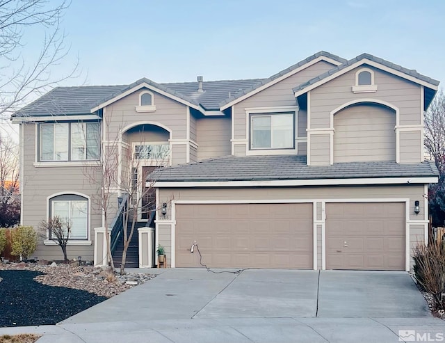 view of front of house with a garage