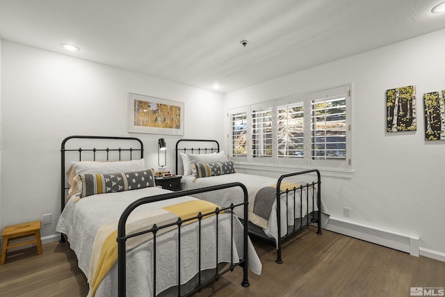 bedroom featuring dark hardwood / wood-style floors