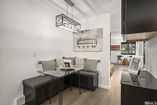 dining space featuring breakfast area and light hardwood / wood-style floors