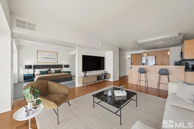 living room featuring light hardwood / wood-style floors