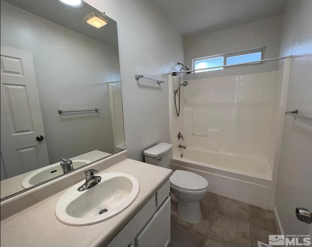 full bathroom with tile patterned flooring, vanity, shower / tub combination, and toilet