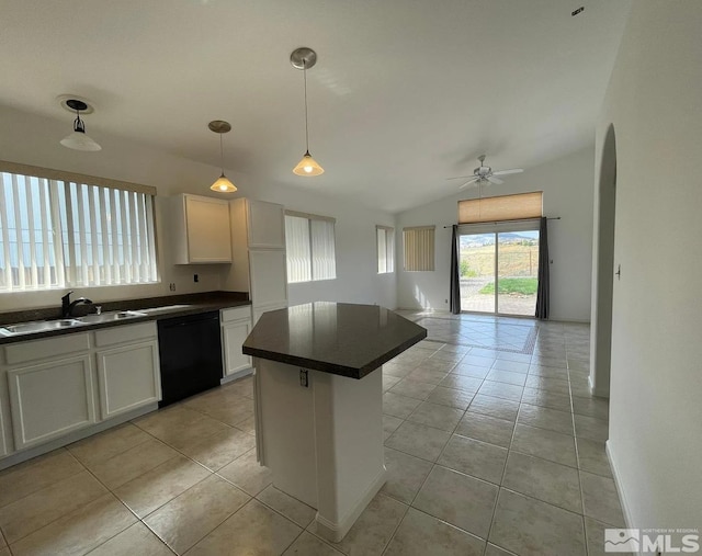 kitchen with decorative light fixtures, white cabinetry, dishwasher, lofted ceiling, and sink