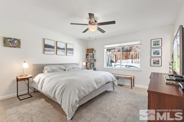 bedroom with light carpet and ceiling fan