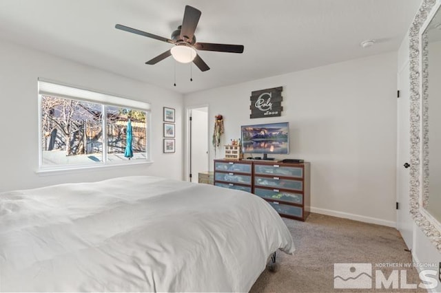 carpeted bedroom featuring ceiling fan