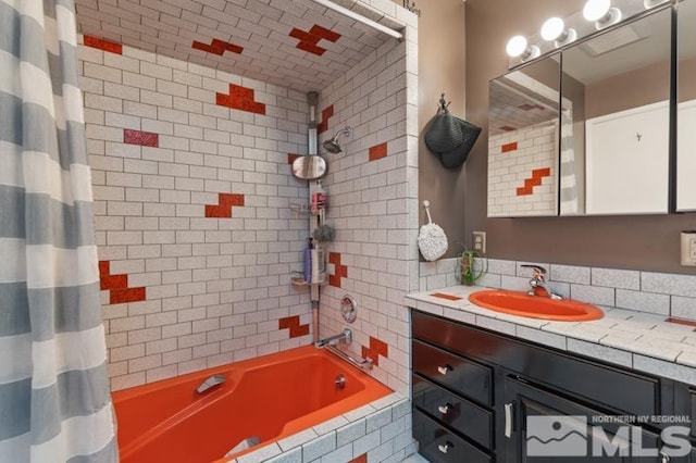 bathroom with vanity and shower / bath combination with curtain