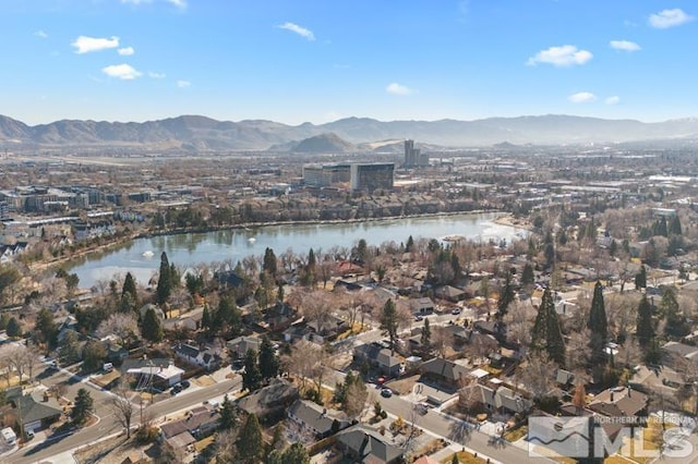 bird's eye view featuring a water and mountain view