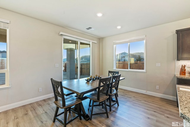 dining room featuring light wood-type flooring