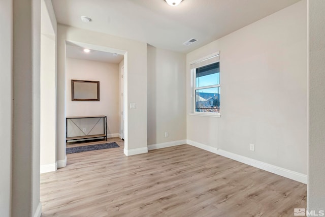 empty room featuring light hardwood / wood-style floors