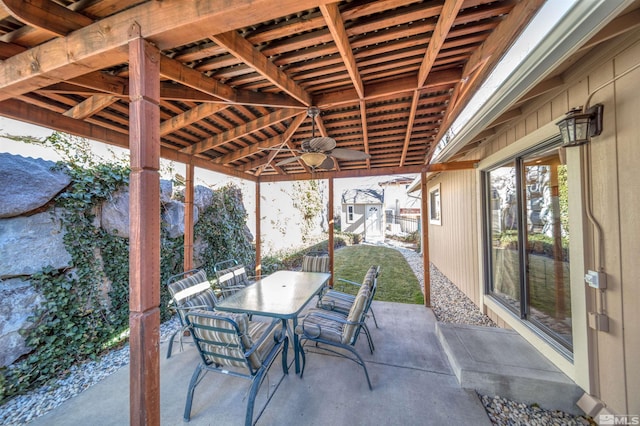 view of patio featuring ceiling fan