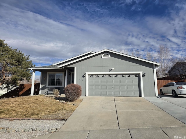 ranch-style house featuring a garage