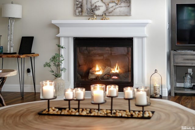 details with hardwood / wood-style flooring