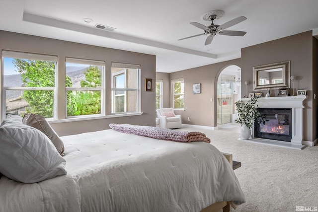 bedroom featuring ceiling fan and carpet floors