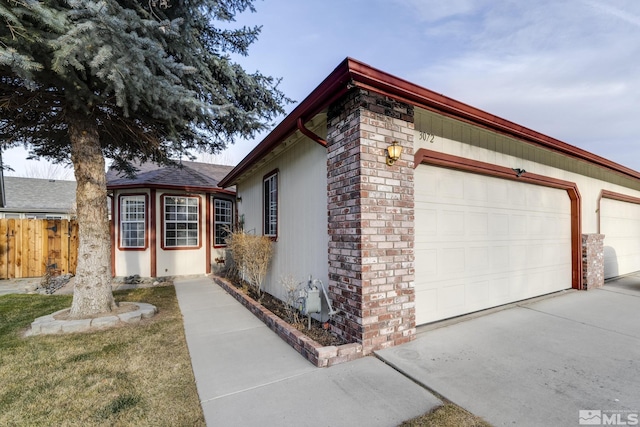 view of property exterior featuring a garage