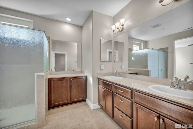 bathroom with vanity and walk in shower